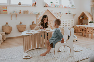 CHILDREN PLAYING ON GOOD WOOD ROCKER AND CHAIR IN WHITE