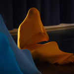 human in intimate bag in tumeric colour 