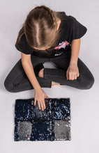 Carica l&#39;immagine nel visualizzatore di Gallery, girl sitting with Two tone sequin weighted lap pillow in black and silver
